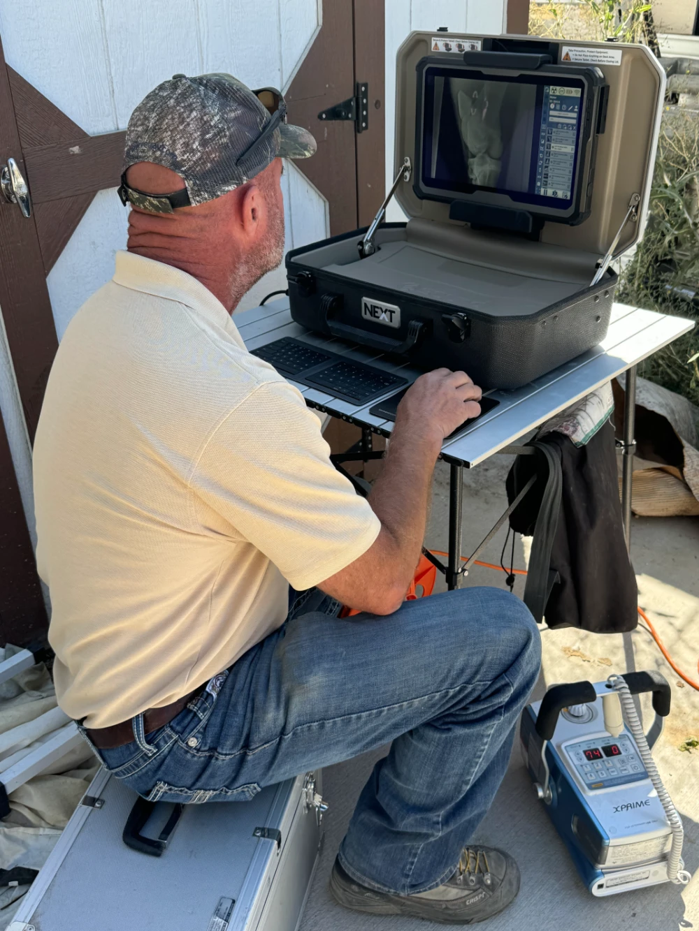 Dr. Danny Borders with state-of-the-art portable equine veterinary equipment for mobile horse care
